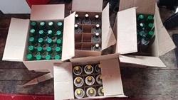 За хранение немаркированной алкогольной продукции супруги предстанут перед судом